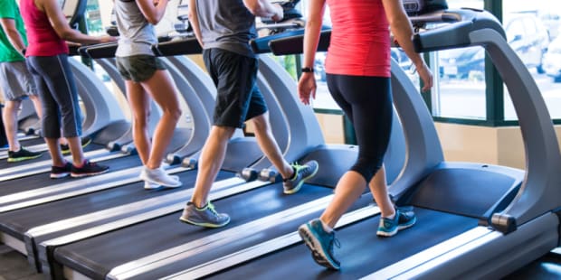 People walking on treadmills