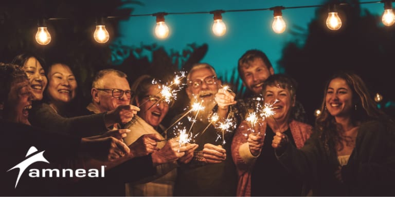Amneal logo bottom left, on a photo of people with sparklers